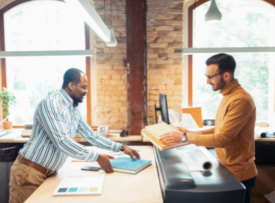 Two Men at Printer